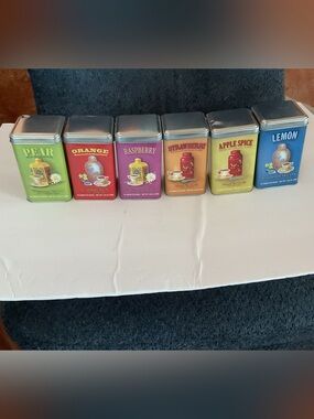 Six vintage style tins. Colorful storage for teas etc.